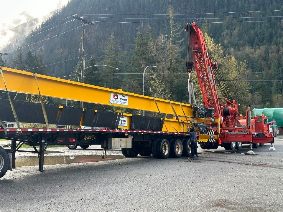 Jamie Davis' Heavy Duty Crane towing some equipment.